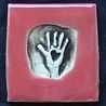 red hand tile