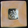 pumkin colored flower tile